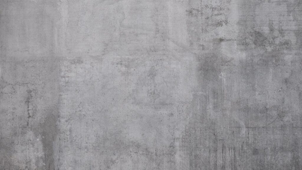 A concrete retaining wall in Auckland prepped for waterproofing, ready for membrane installation by Auckland Waterproofing Experts