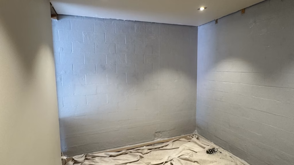 Basement walls in Parnell sealed with grey ARDEX WPM 300 HydrEpoxy after successful internal waterproofing of a leaking wall.